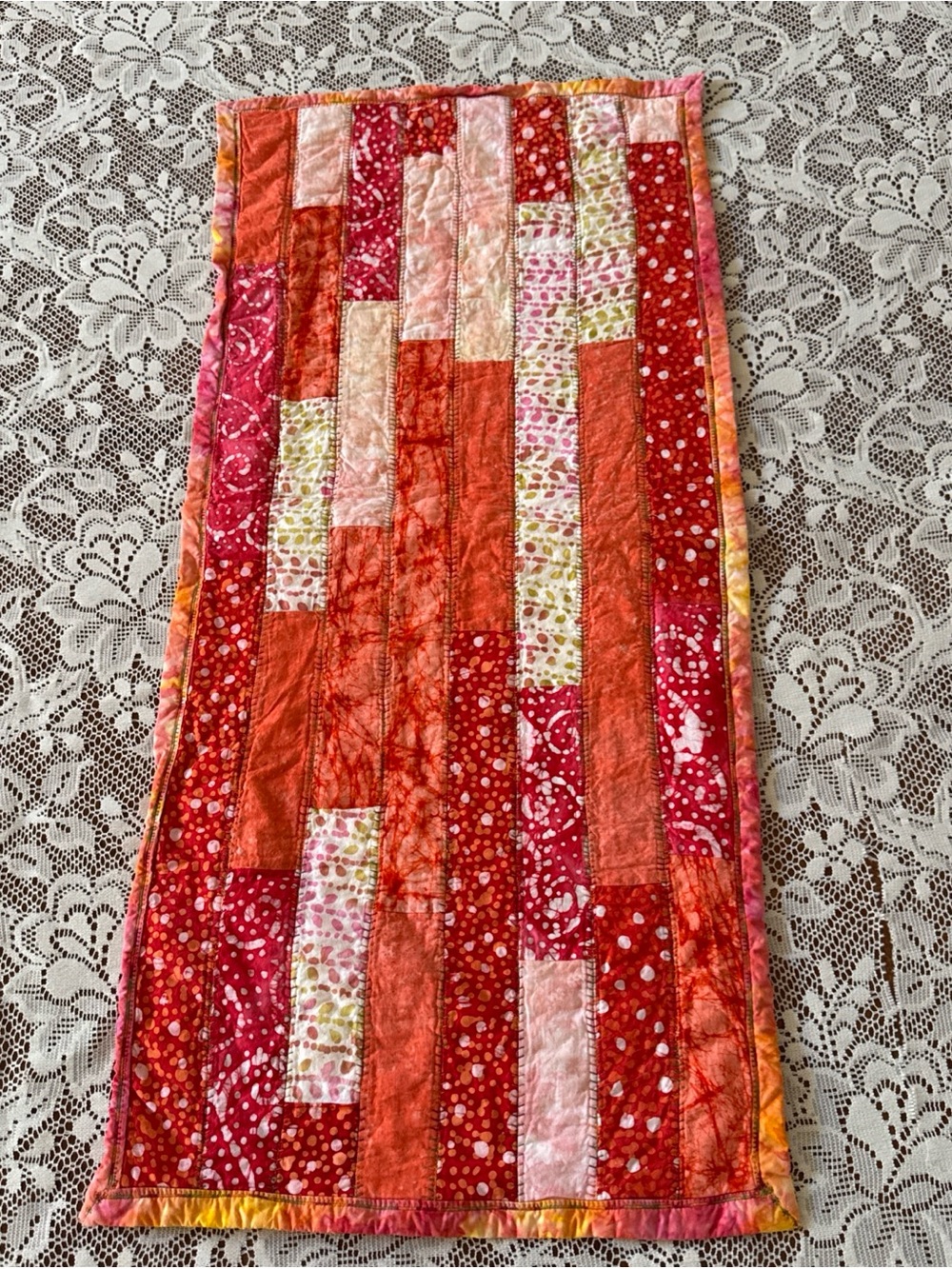 Handmade Quilted Table Runner 35” x 16” Boho Batik Patchwork Red Orange Pink